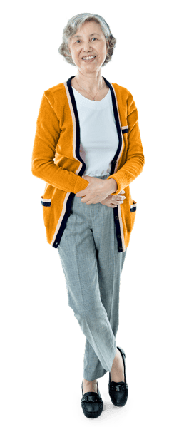 Elderly woman standing and smiling Elderly woman standing and smiling