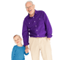 A child holds hands with a grandparent